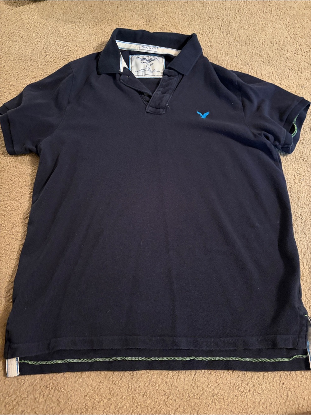 Vintage fit American Eagle Men's Navy Polo Shirt with Blue Logo
